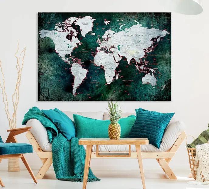 A stylish living room showcases a triptych 'Canvas World Map' on gallery-wrapped, museum-quality canvases decorating the wall.