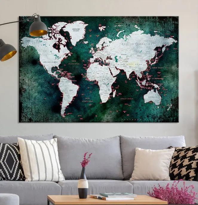 A stylish living room showcases a triptych 'Canvas World Map' on gallery-wrapped, museum-quality canvases decorating the wall.