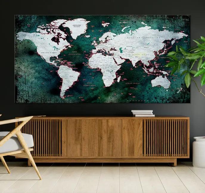 A stylish living room showcases a triptych 'Canvas World Map' on gallery-wrapped, museum-quality canvases decorating the wall.