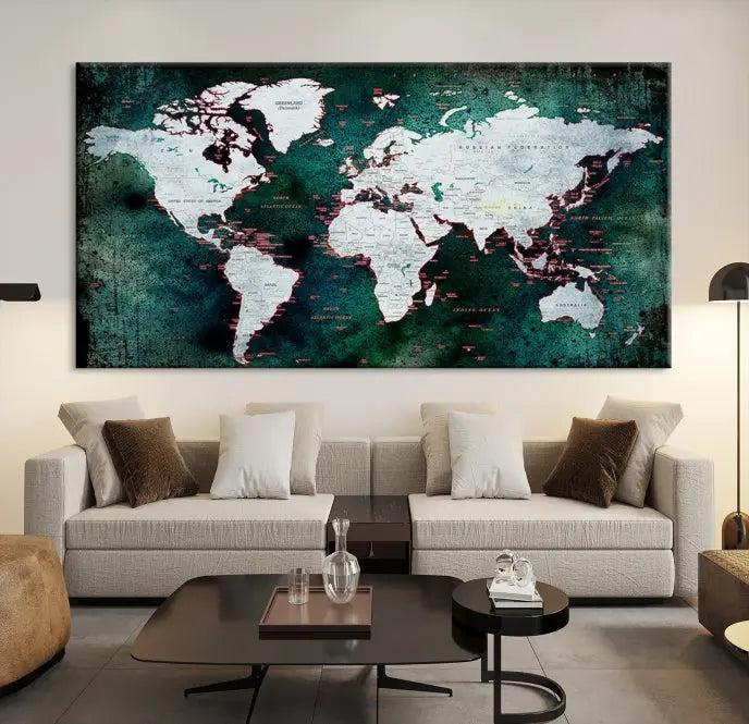 A stylish living room showcases a triptych 'Canvas World Map' on gallery-wrapped, museum-quality canvases decorating the wall.