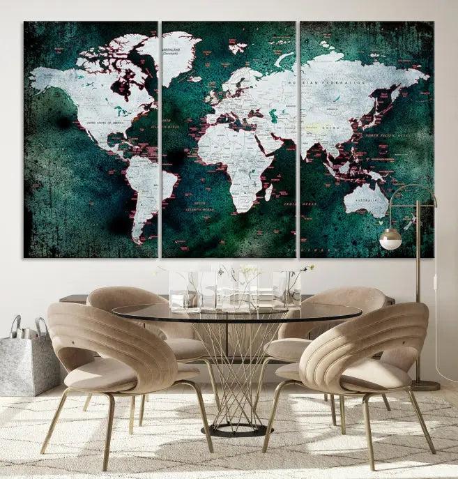 A stylish living room showcases a triptych 'Canvas World Map' on gallery-wrapped, museum-quality canvases decorating the wall.