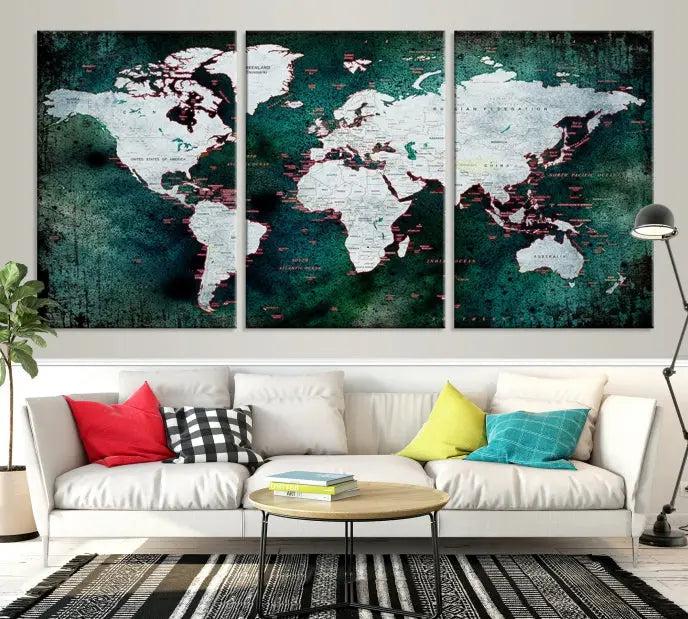 A stylish living room showcases a triptych 'Canvas World Map' on gallery-wrapped, museum-quality canvases decorating the wall.