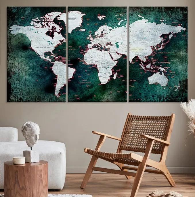 A stylish living room showcases a triptych 'Canvas World Map' on gallery-wrapped, museum-quality canvases decorating the wall.