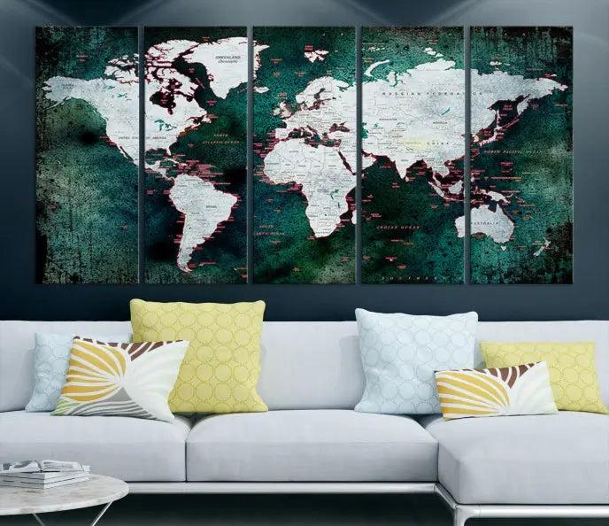 A stylish living room showcases a triptych 'Canvas World Map' on gallery-wrapped, museum-quality canvases decorating the wall.