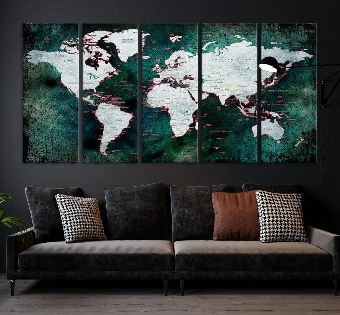 A stylish living room showcases a triptych 'Canvas World Map' on gallery-wrapped, museum-quality canvases decorating the wall.