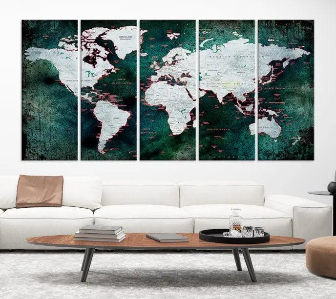 A stylish living room showcases a triptych 'Canvas World Map' on gallery-wrapped, museum-quality canvases decorating the wall.