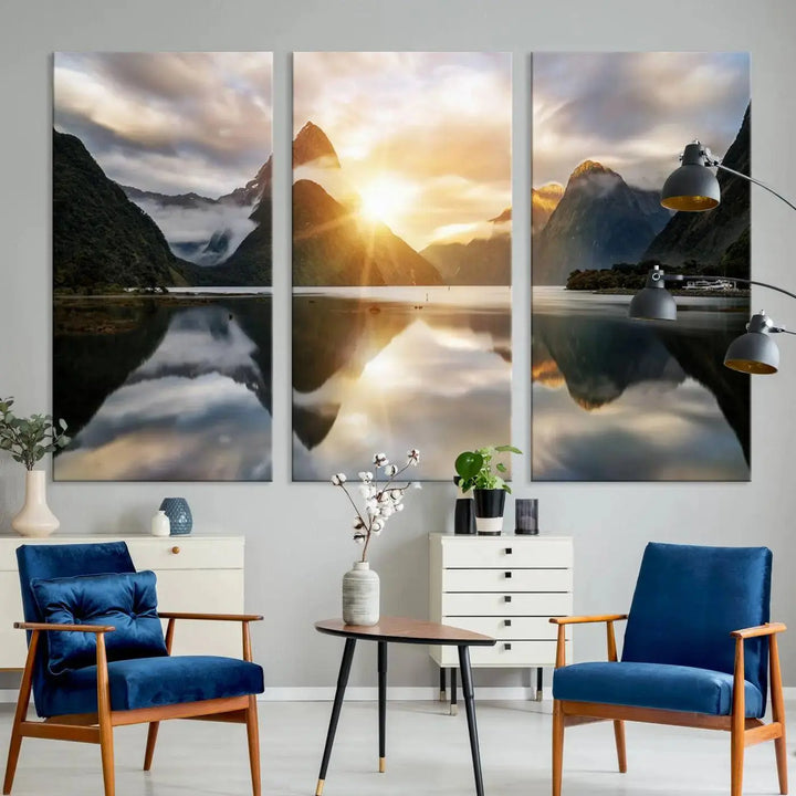 A captivating natural landscape wall art canvas print features a serene lake and majestic mountains illuminated by a dramatic sunset. This gallery-wrapped image is printed on museum-quality polycotton canvas, ensuring its timeless charm for years to come.