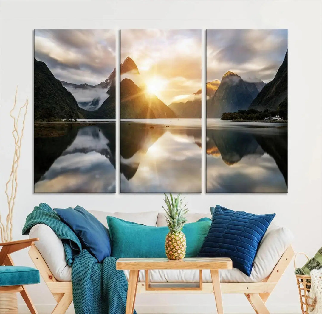 A captivating natural landscape wall art canvas print features a serene lake and majestic mountains illuminated by a dramatic sunset. This gallery-wrapped image is printed on museum-quality polycotton canvas, ensuring its timeless charm for years to come.