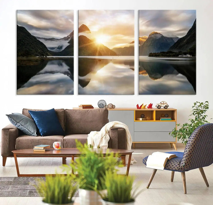 A captivating natural landscape wall art canvas print features a serene lake and majestic mountains illuminated by a dramatic sunset. This gallery-wrapped image is printed on museum-quality polycotton canvas, ensuring its timeless charm for years to come.