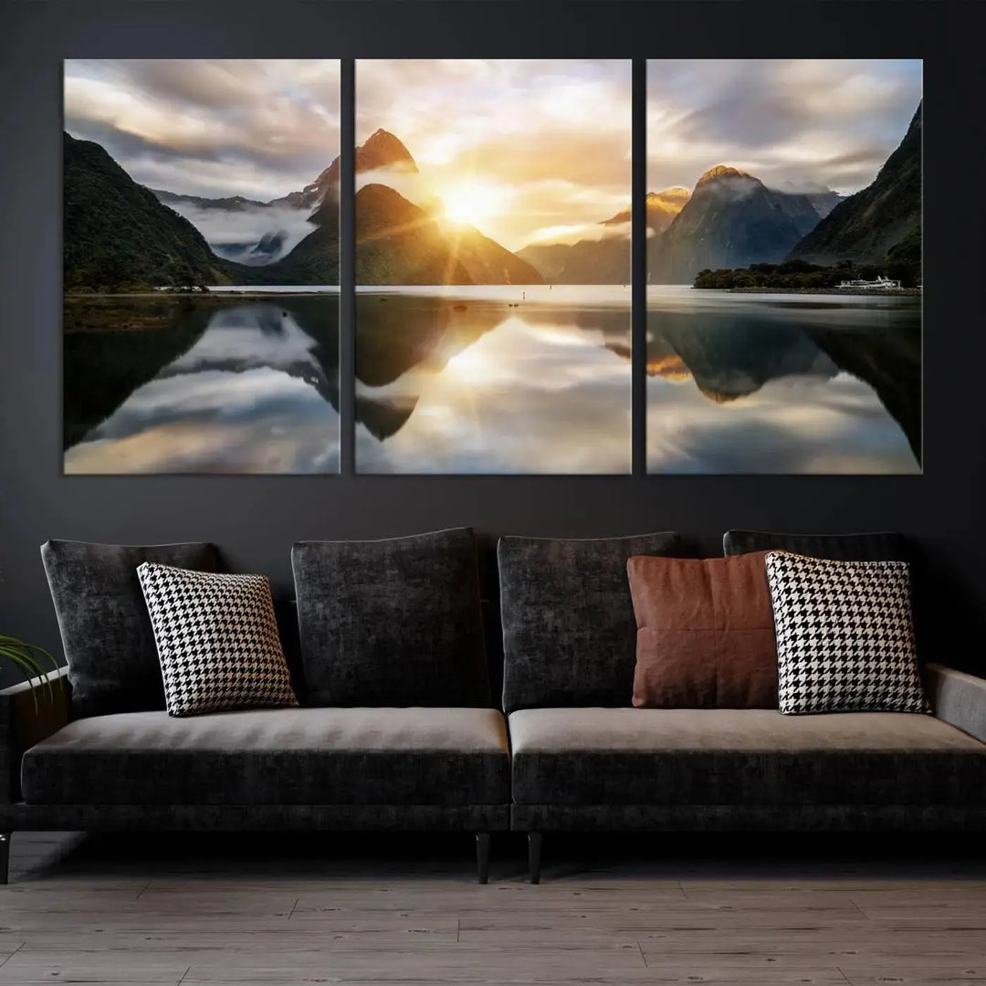 A captivating natural landscape wall art canvas print features a serene lake and majestic mountains illuminated by a dramatic sunset. This gallery-wrapped image is printed on museum-quality polycotton canvas, ensuring its timeless charm for years to come.