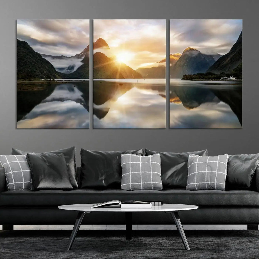 A captivating natural landscape wall art canvas print features a serene lake and majestic mountains illuminated by a dramatic sunset. This gallery-wrapped image is printed on museum-quality polycotton canvas, ensuring its timeless charm for years to come.