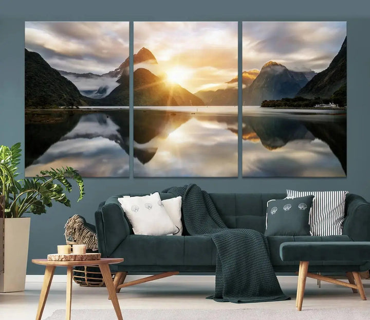 A captivating natural landscape wall art canvas print features a serene lake and majestic mountains illuminated by a dramatic sunset. This gallery-wrapped image is printed on museum-quality polycotton canvas, ensuring its timeless charm for years to come.