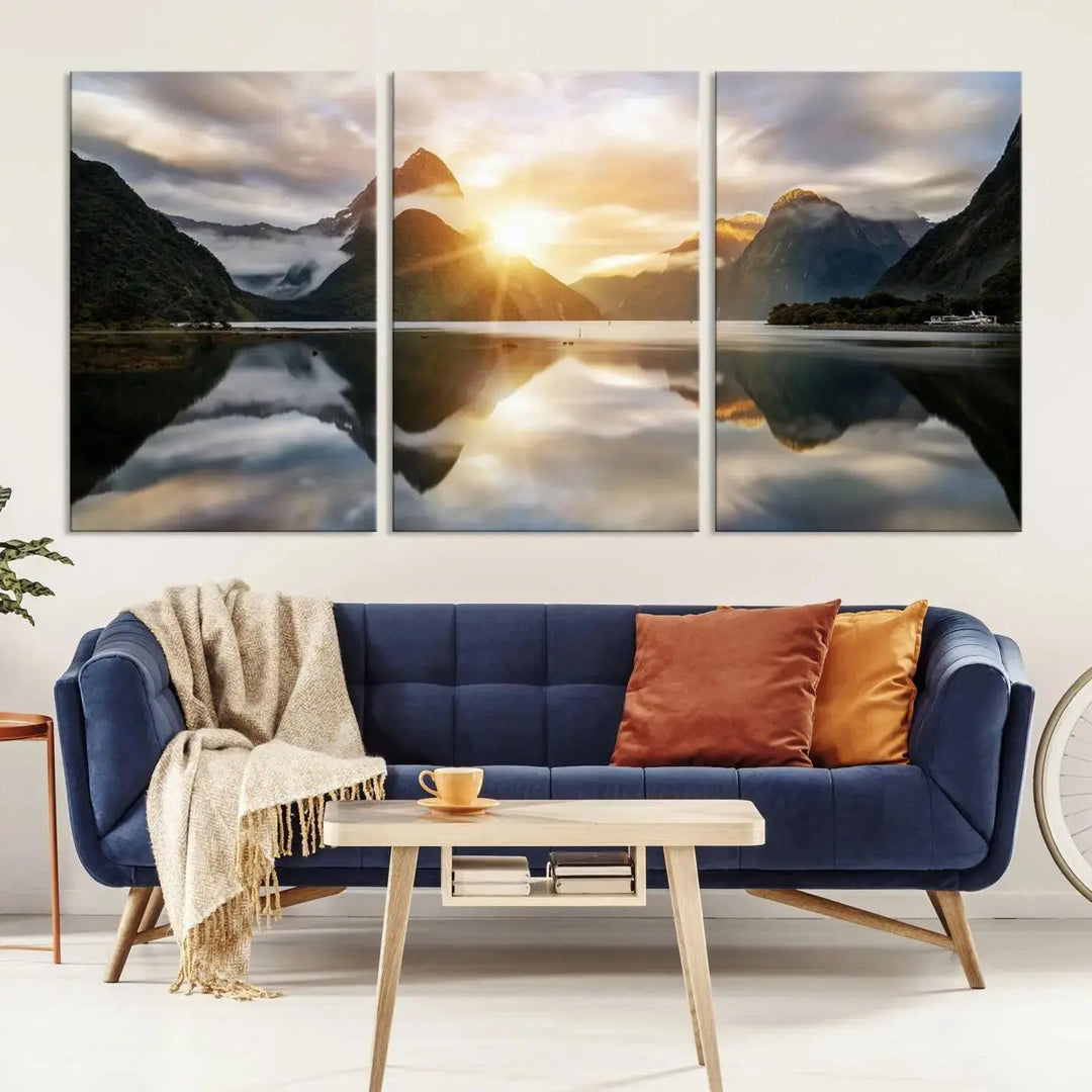 A captivating natural landscape wall art canvas print features a serene lake and majestic mountains illuminated by a dramatic sunset. This gallery-wrapped image is printed on museum-quality polycotton canvas, ensuring its timeless charm for years to come.