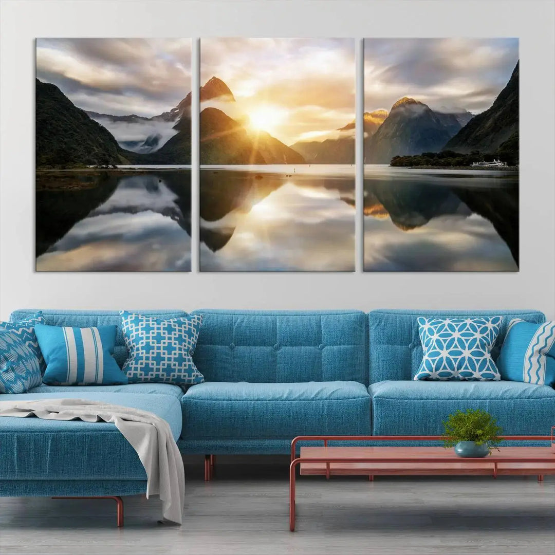 A captivating natural landscape wall art canvas print features a serene lake and majestic mountains illuminated by a dramatic sunset. This gallery-wrapped image is printed on museum-quality polycotton canvas, ensuring its timeless charm for years to come.