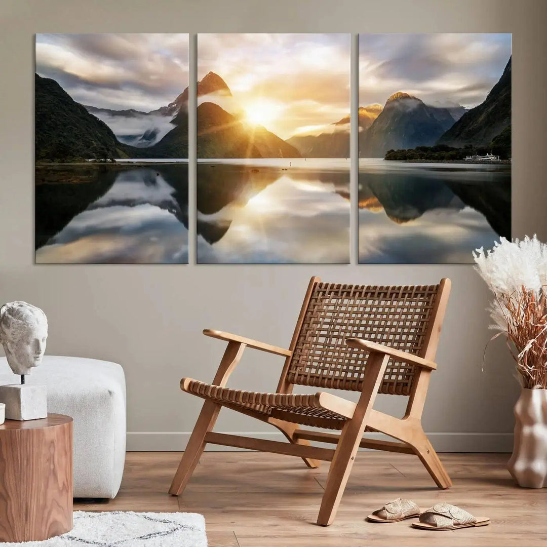 A captivating natural landscape wall art canvas print features a serene lake and majestic mountains illuminated by a dramatic sunset. This gallery-wrapped image is printed on museum-quality polycotton canvas, ensuring its timeless charm for years to come.