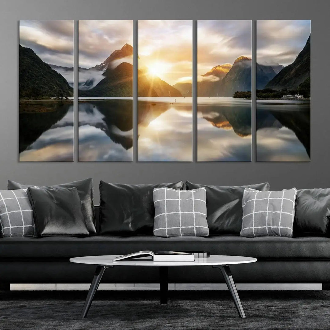 A captivating natural landscape wall art canvas print features a serene lake and majestic mountains illuminated by a dramatic sunset. This gallery-wrapped image is printed on museum-quality polycotton canvas, ensuring its timeless charm for years to come.