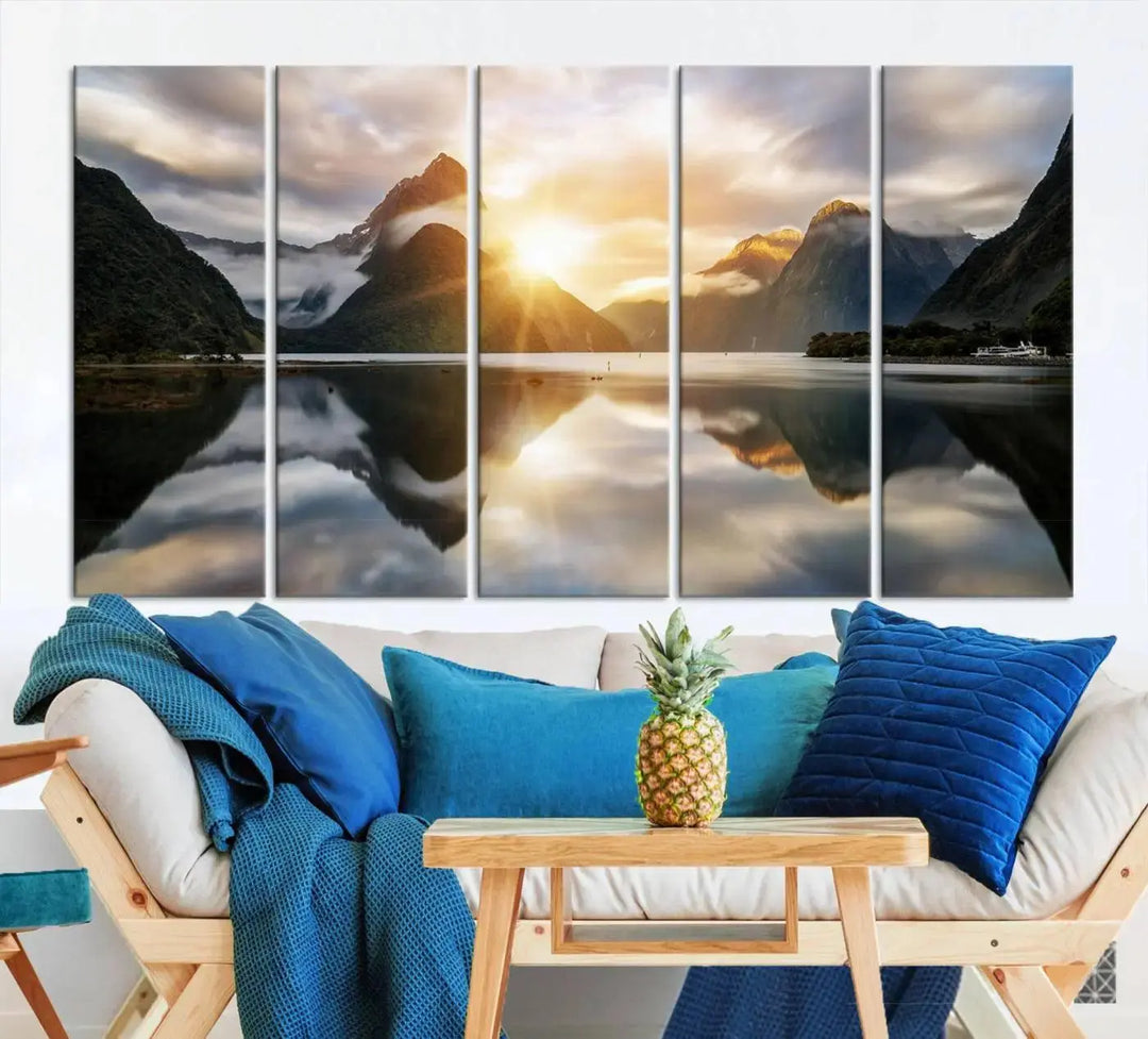 A captivating natural landscape wall art canvas print features a serene lake and majestic mountains illuminated by a dramatic sunset. This gallery-wrapped image is printed on museum-quality polycotton canvas, ensuring its timeless charm for years to come.