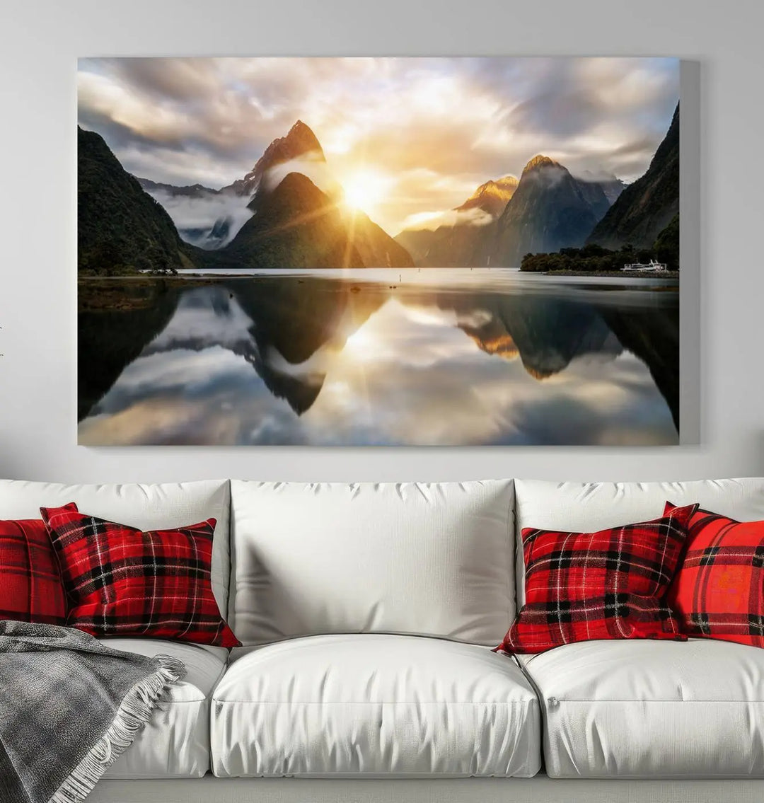 A captivating natural landscape wall art canvas print features a serene lake and majestic mountains illuminated by a dramatic sunset. This gallery-wrapped image is printed on museum-quality polycotton canvas, ensuring its timeless charm for years to come.