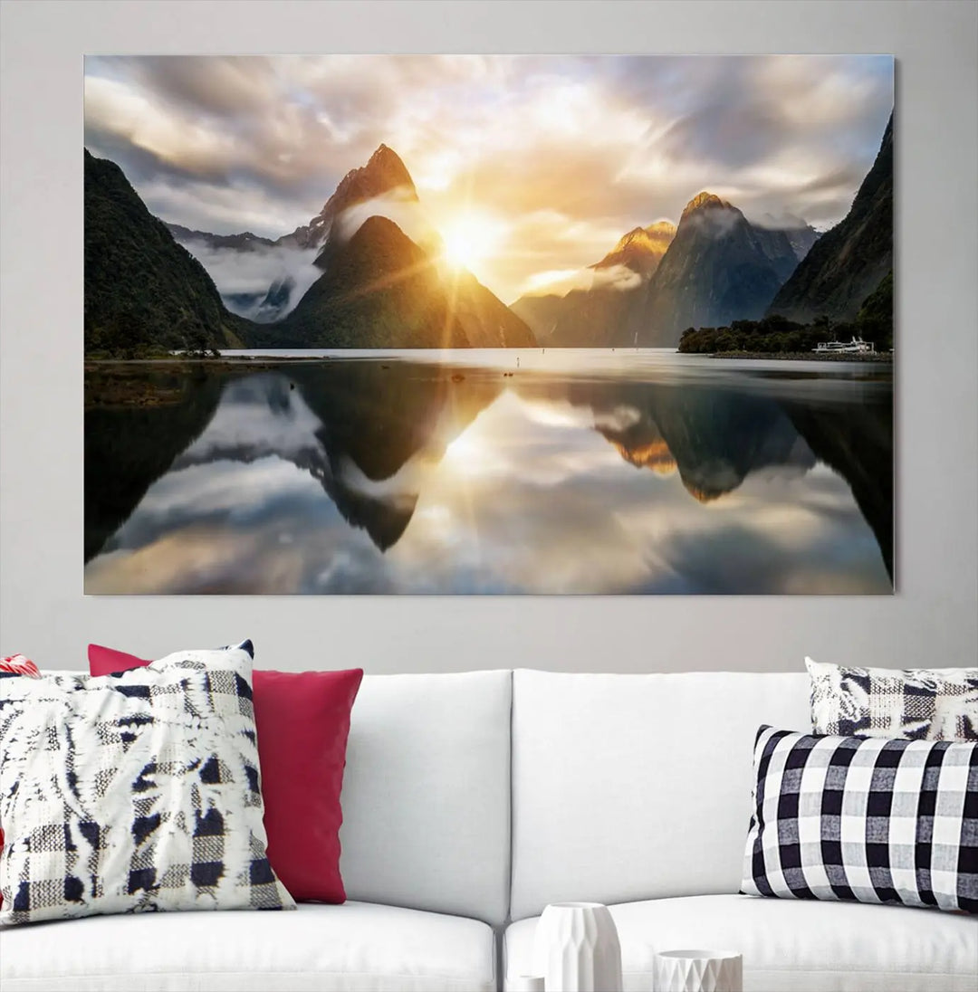 A captivating natural landscape wall art canvas print features a serene lake and majestic mountains illuminated by a dramatic sunset. This gallery-wrapped image is printed on museum-quality polycotton canvas, ensuring its timeless charm for years to come.