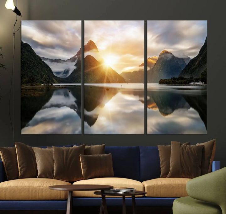 A captivating natural landscape wall art canvas print features a serene lake and majestic mountains illuminated by a dramatic sunset. This gallery-wrapped image is printed on museum-quality polycotton canvas, ensuring its timeless charm for years to come.