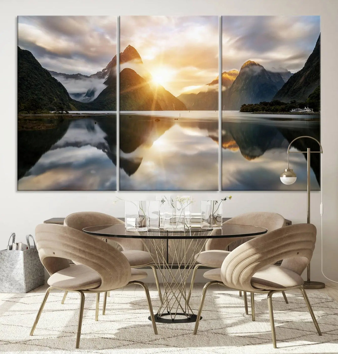 A captivating natural landscape wall art canvas print features a serene lake and majestic mountains illuminated by a dramatic sunset. This gallery-wrapped image is printed on museum-quality polycotton canvas, ensuring its timeless charm for years to come.