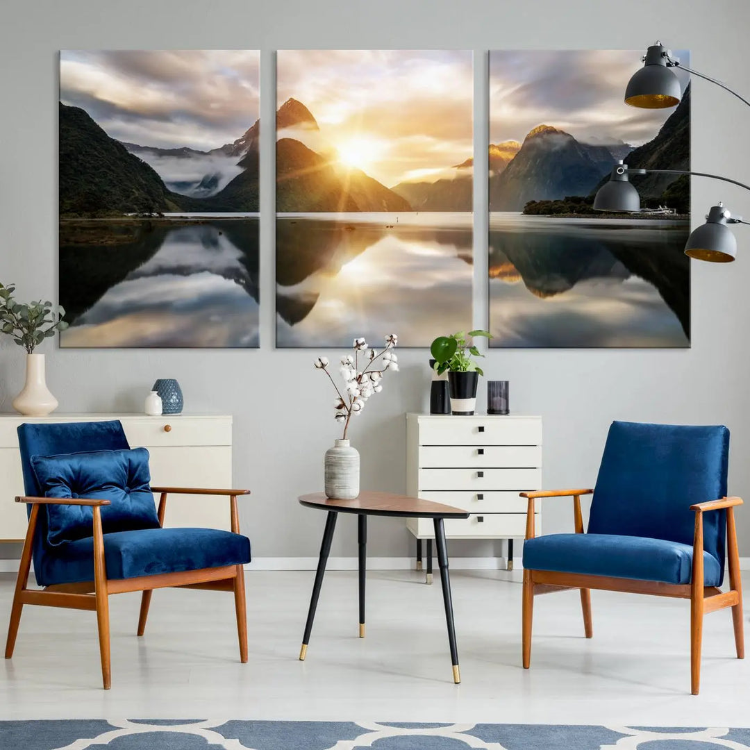 A captivating natural landscape wall art canvas print features a serene lake and majestic mountains illuminated by a dramatic sunset. This gallery-wrapped image is printed on museum-quality polycotton canvas, ensuring its timeless charm for years to come.