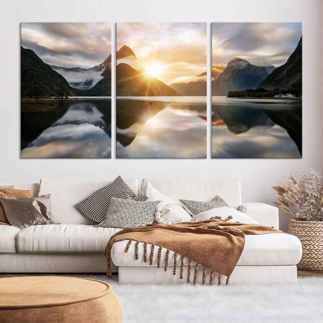 A captivating natural landscape wall art canvas print features a serene lake and majestic mountains illuminated by a dramatic sunset. This gallery-wrapped image is printed on museum-quality polycotton canvas, ensuring its timeless charm for years to come.