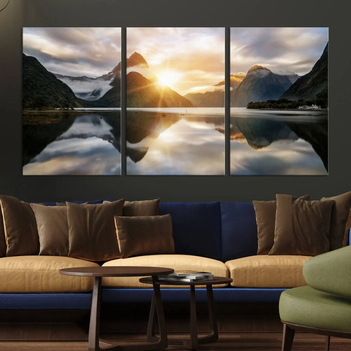 A captivating natural landscape wall art canvas print features a serene lake and majestic mountains illuminated by a dramatic sunset. This gallery-wrapped image is printed on museum-quality polycotton canvas, ensuring its timeless charm for years to come.