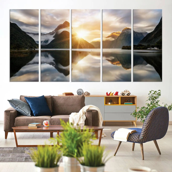 A captivating natural landscape wall art canvas print features a serene lake and majestic mountains illuminated by a dramatic sunset. This gallery-wrapped image is printed on museum-quality polycotton canvas, ensuring its timeless charm for years to come.