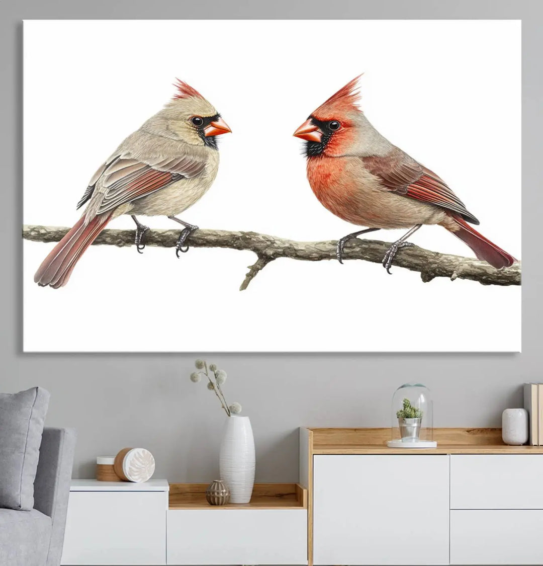 The Cardinal Canvas Wall Art enhances a stylish living room with vibrant nature-inspired cardinals.