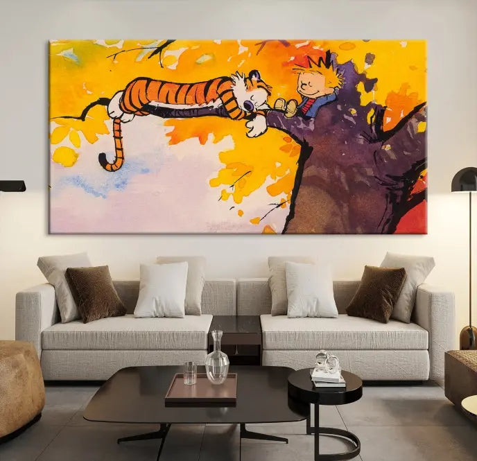 The Cartoon Wall Art Calvin and Hobbes Canvas Print features a boy and a tiger lounging on a tree branch amidst vibrant autumn leaves. Crafted on museum-quality canvases with UV-protective coating, this artwork elevates any room.