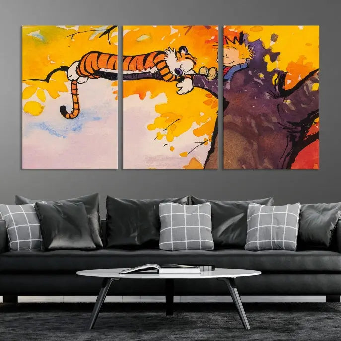 The Cartoon Wall Art Calvin and Hobbes Canvas Print features a boy and a tiger lounging on a tree branch amidst vibrant autumn leaves. Crafted on museum-quality canvases with UV-protective coating, this artwork elevates any room.