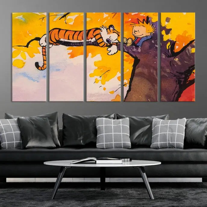 The Cartoon Wall Art Calvin and Hobbes Canvas Print features a boy and a tiger lounging on a tree branch amidst vibrant autumn leaves. Crafted on museum-quality canvases with UV-protective coating, this artwork elevates any room.