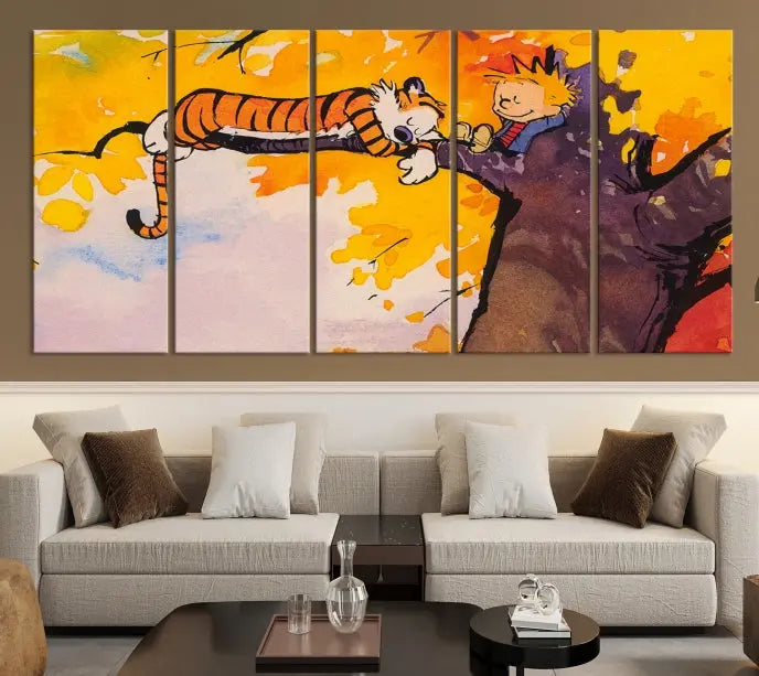 The Cartoon Wall Art Calvin and Hobbes Canvas Print features a boy and a tiger lounging on a tree branch amidst vibrant autumn leaves. Crafted on museum-quality canvases with UV-protective coating, this artwork elevates any room.