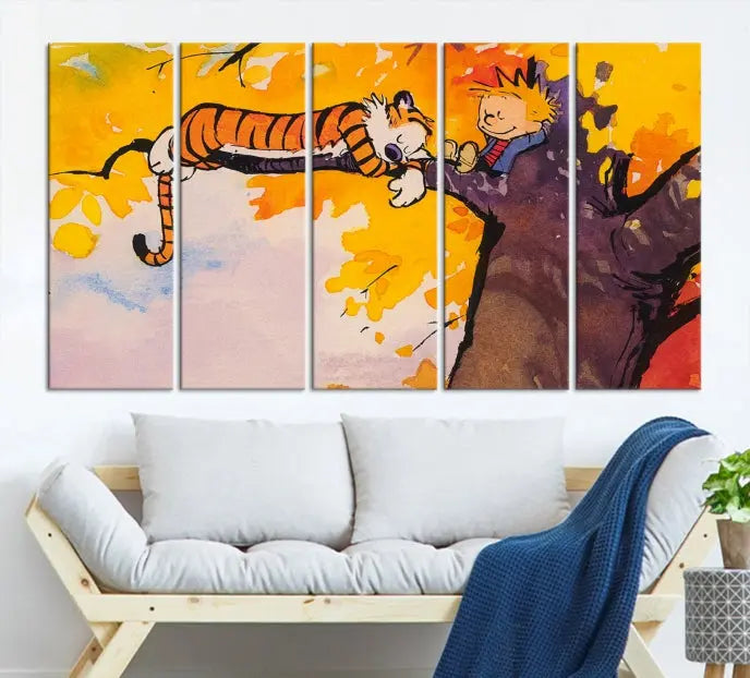 The Cartoon Wall Art Calvin and Hobbes Canvas Print features a boy and a tiger lounging on a tree branch amidst vibrant autumn leaves. Crafted on museum-quality canvases with UV-protective coating, this artwork elevates any room.