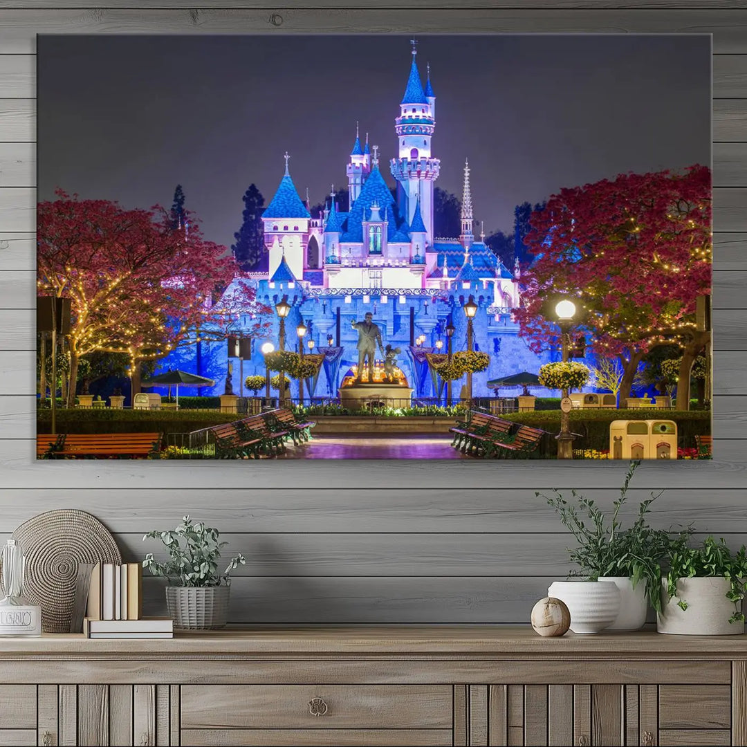 The Large Disney Castle Canvas Print captures a brightly lit castle at night.