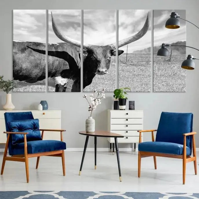 A black and white image of a longhorn cow, expertly divided into three panels, is printed on high-quality poly-cotton canvas. This Cattle Wall Art Longhorn Cow Canvas Print is professionally hand-assembled. Enjoy the ease of free shipping included with your purchase for ultimate convenience.