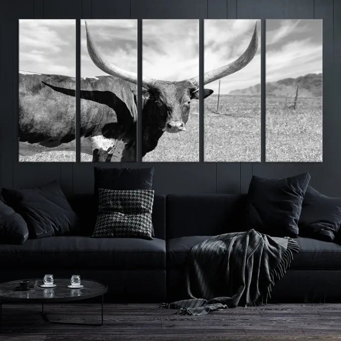 A black and white image of a longhorn cow, expertly divided into three panels, is printed on high-quality poly-cotton canvas. This Cattle Wall Art Longhorn Cow Canvas Print is professionally hand-assembled. Enjoy the ease of free shipping included with your purchase for ultimate convenience.