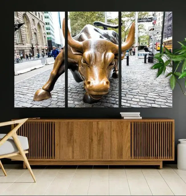 A living room showcases a triptych of the Charging Bull Wall Art Canvas Print on museum-quality canvas.