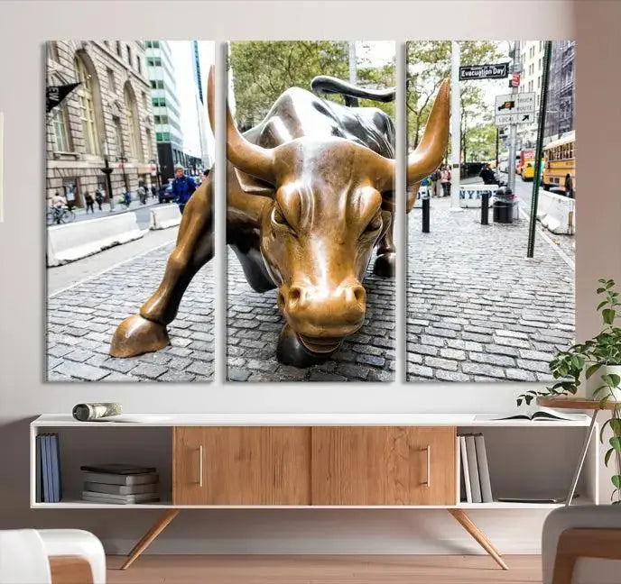 A living room showcases a triptych of the Charging Bull Wall Art Canvas Print on museum-quality canvas.