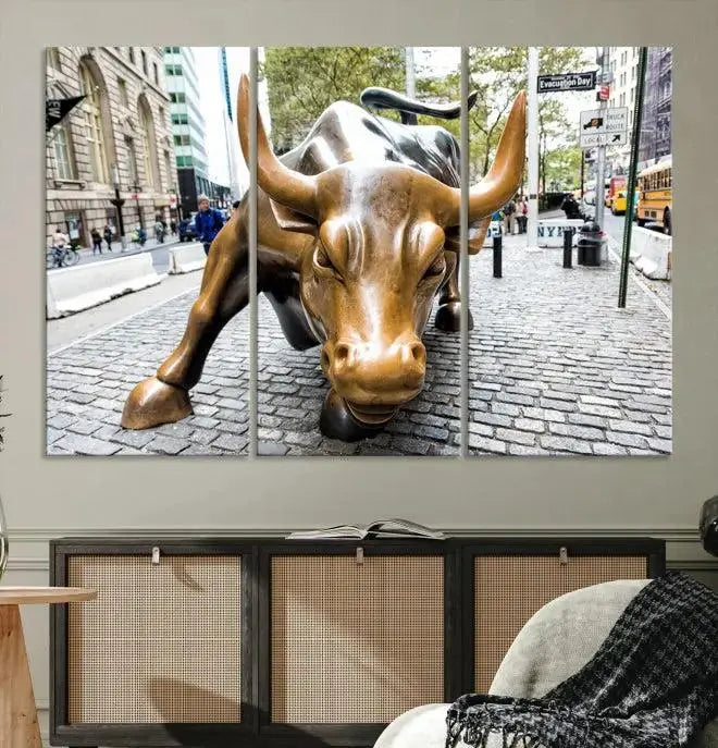 A living room showcases a triptych of the Charging Bull Wall Art Canvas Print on museum-quality canvas.