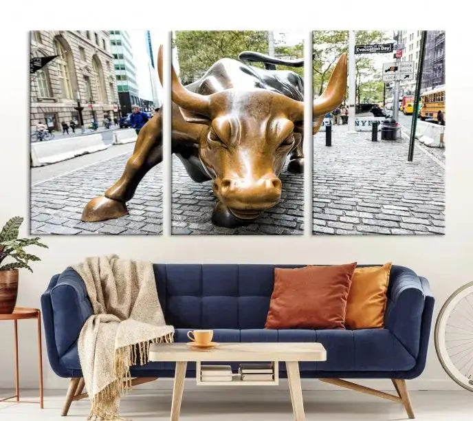 A living room showcases a triptych of the Charging Bull Wall Art Canvas Print on museum-quality canvas.