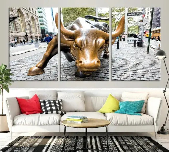 A living room showcases a triptych of the Charging Bull Wall Art Canvas Print on museum-quality canvas.