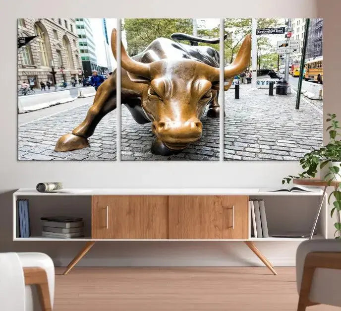 A living room showcases a triptych of the Charging Bull Wall Art Canvas Print on museum-quality canvas.