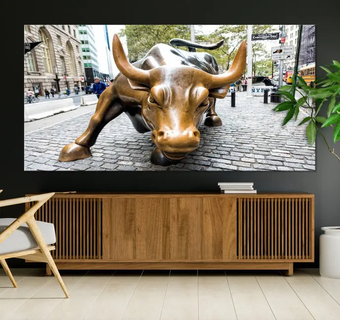 A living room showcases a triptych of the Charging Bull Wall Art Canvas Print on museum-quality canvas.