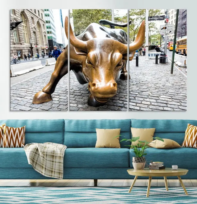 A living room showcases a triptych of the Charging Bull Wall Art Canvas Print on museum-quality canvas.