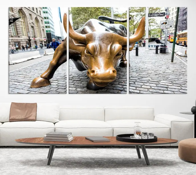 A living room showcases a triptych of the Charging Bull Wall Art Canvas Print on museum-quality canvas.