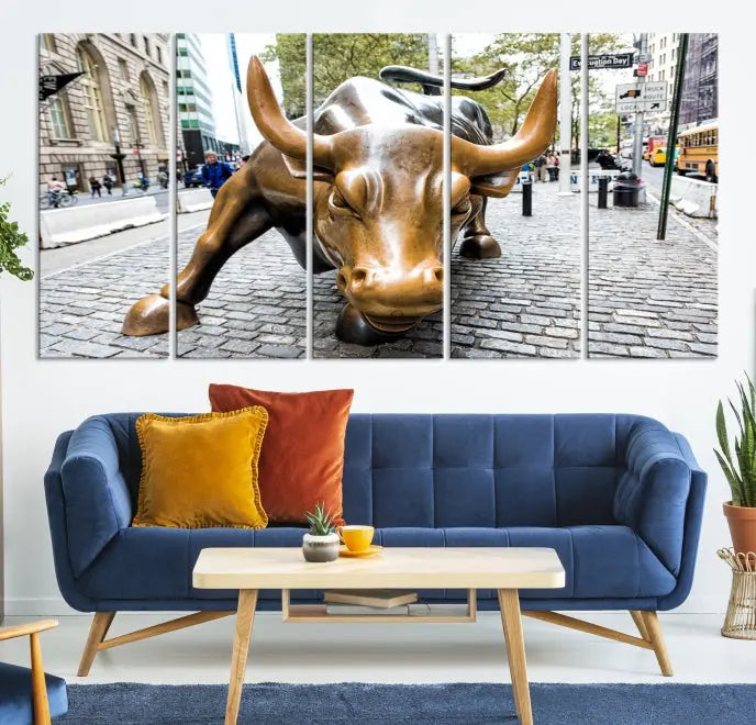 A living room showcases a triptych of the Charging Bull Wall Art Canvas Print on museum-quality canvas.