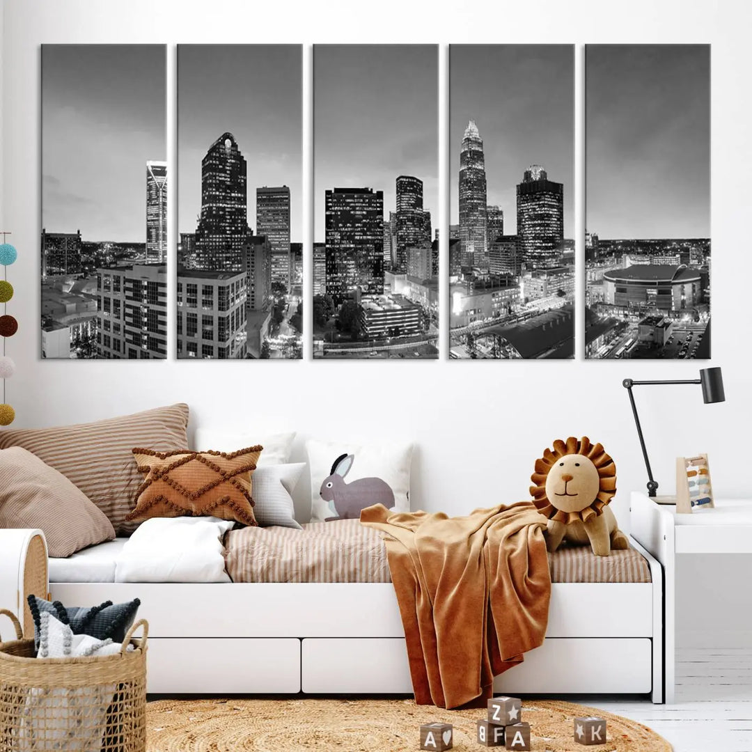 The "Charlotte City Cloudy Skyline Black and White Wall Art Cityscape Canvas Print" hangs on a dark wall, showcasing its UV-protective properties for enduring beauty.