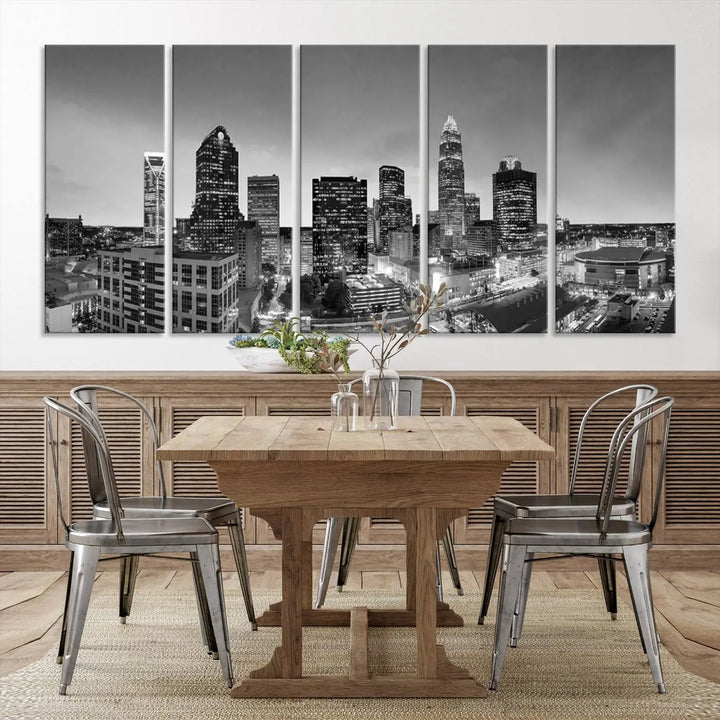 The "Charlotte City Cloudy Skyline Black and White Wall Art Cityscape Canvas Print" hangs on a dark wall, showcasing its UV-protective properties for enduring beauty.